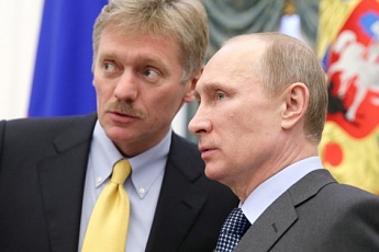 Песков и Путин. Фото: ТАСС
